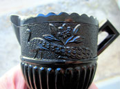 Sowerby black sugar and cream with peacock decoration