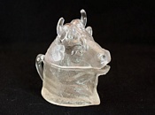 Matthew Turnbull clear glass mustard put in shape of bull's head, from side