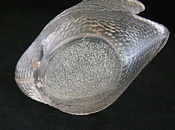 Clear glass swans showing mottled base