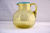 Sowerby Venetian glass, medium size green jug with blue rim