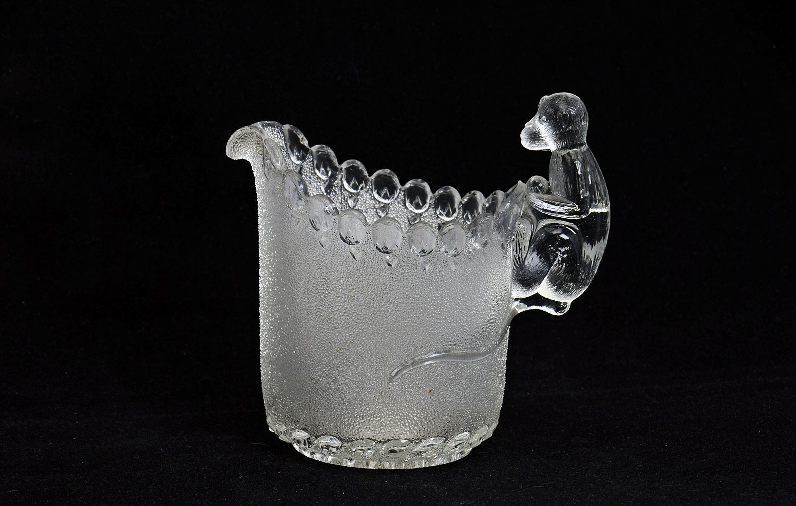 Sowerby clear glass, cream jug with monkey handle