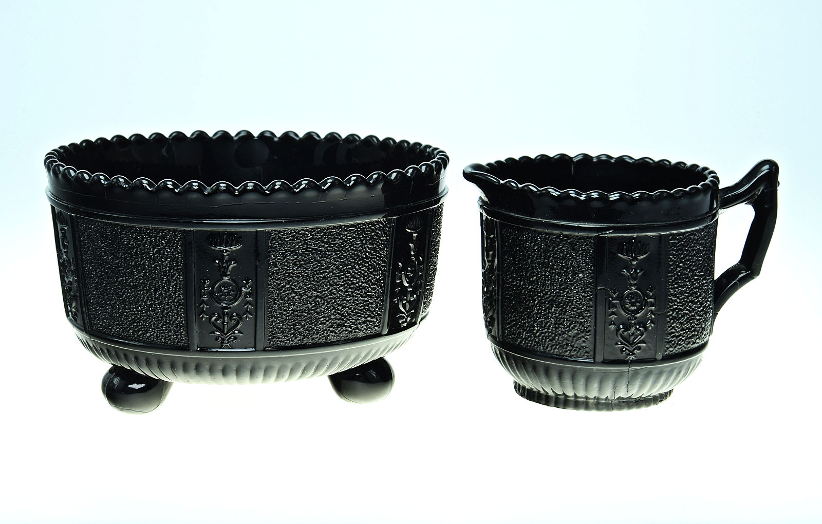 Sowerby jet black, sugar and cream with with Maw & Co tile decoration