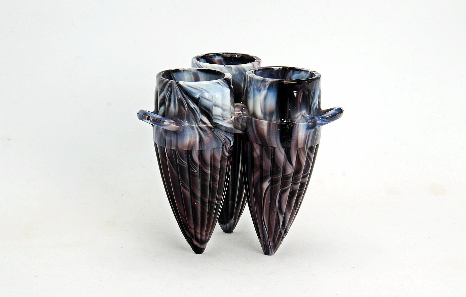 Sowerby purple malachite, vase of 3 pointed, ribbed shapes with handles moulded together