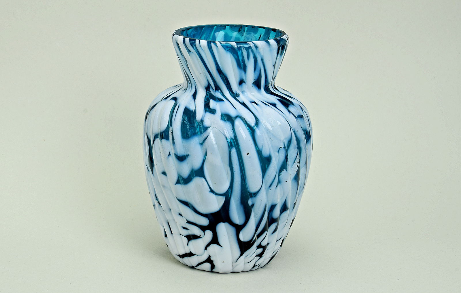 Sowerby marble glass, ribbed translucent blue vase with white marbling