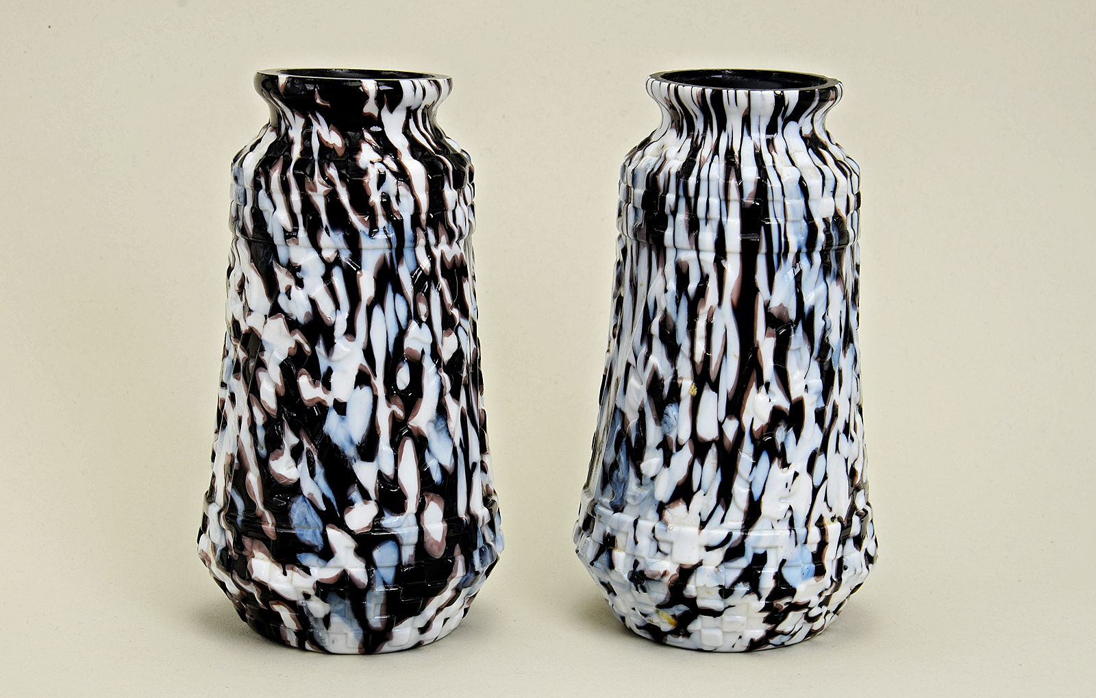 Sowerby marble glass, pair of black vases with white and blue marbling, white has mixed with black to produce brown highlights