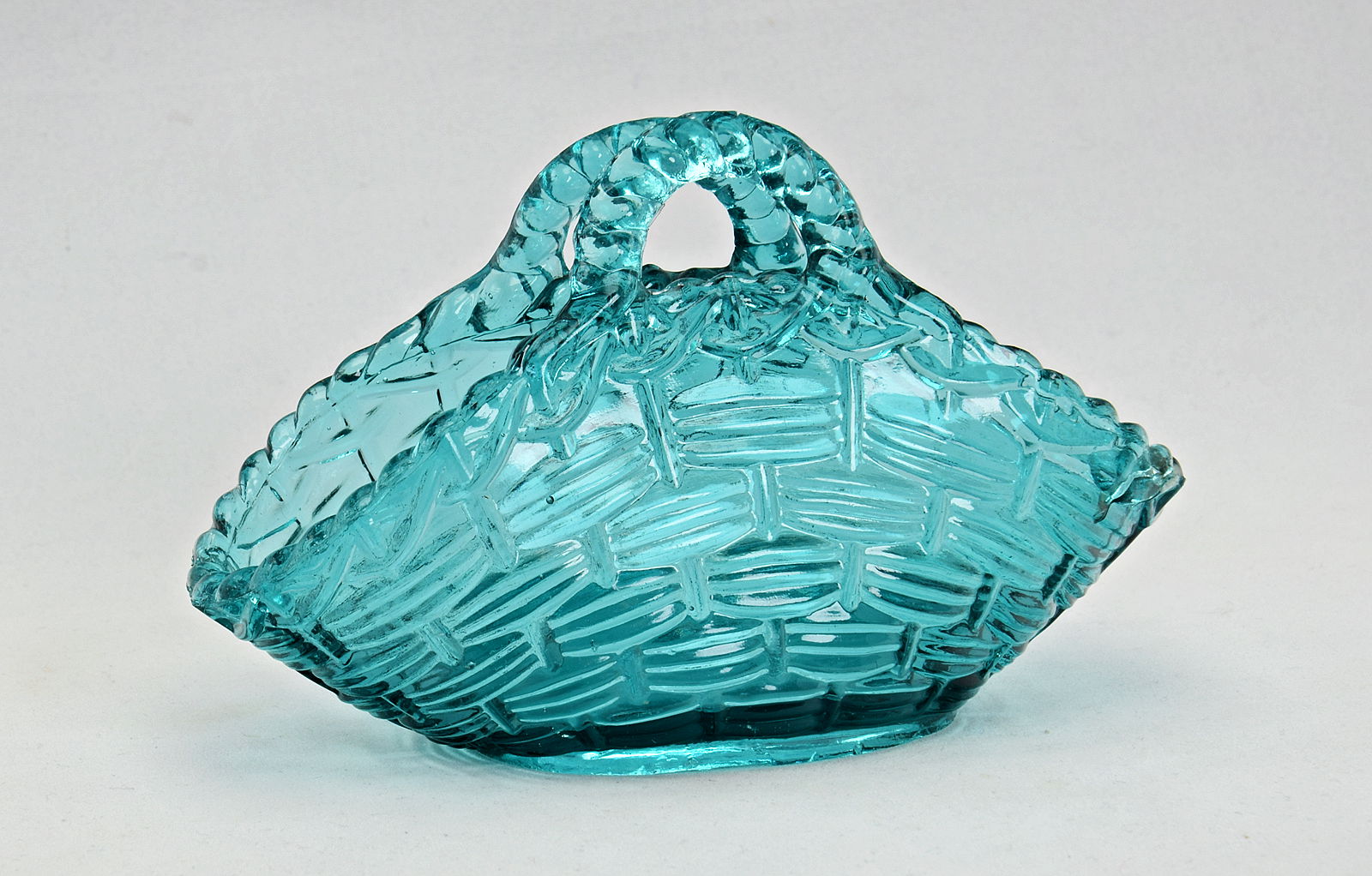 Sowerby translucent teal green 2 handled closed vase with basket weave pattern