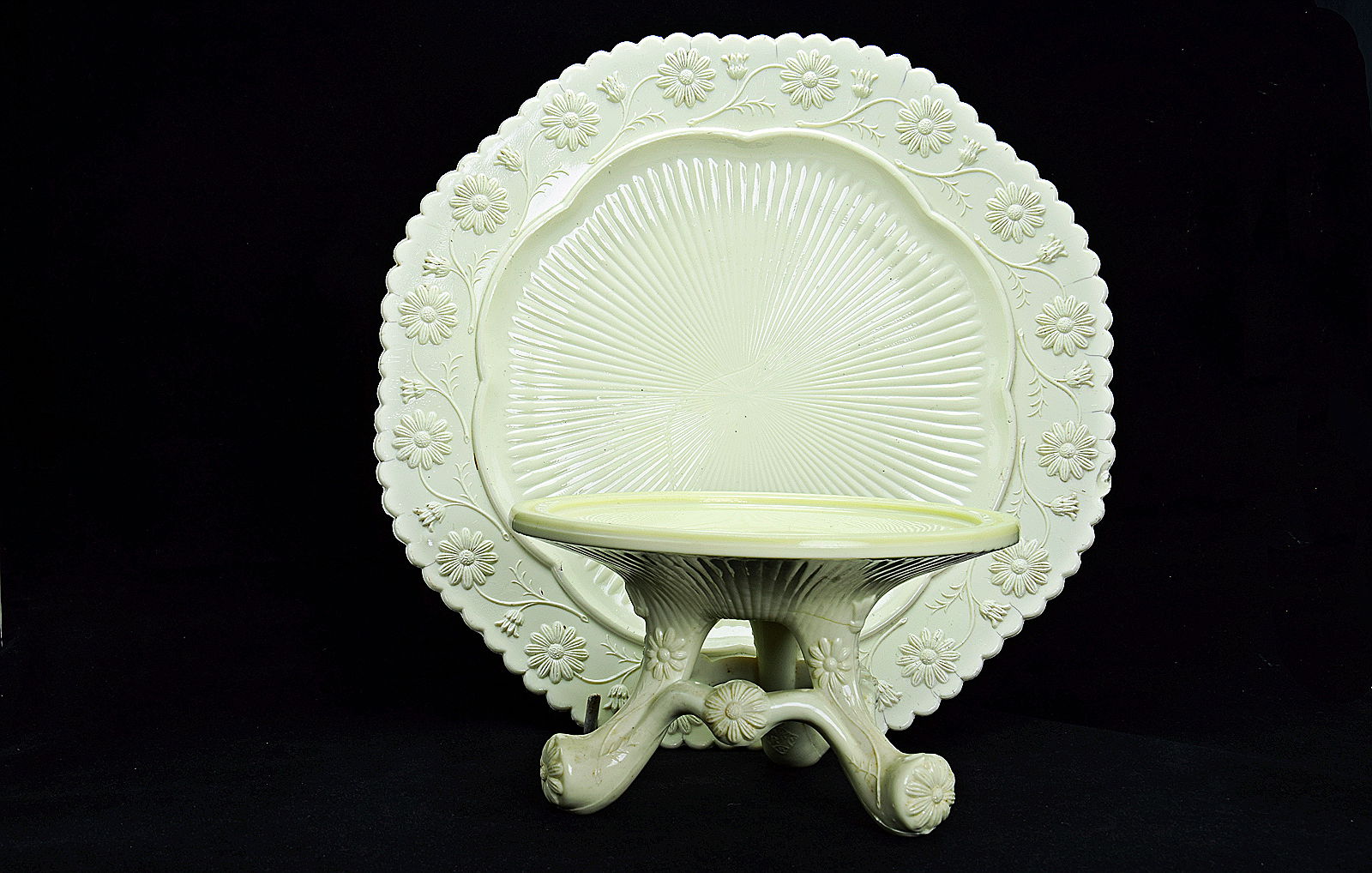 Sowerby Ivory Queensware, detail - large Queensware plate on comport base with 3 feet and flower decoration