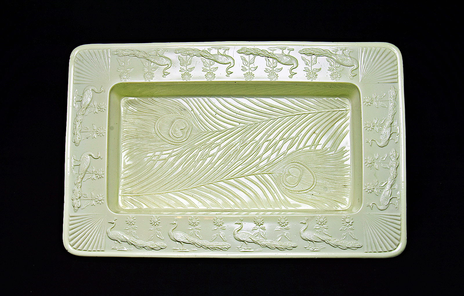 Sowerby Ivory Queensware, detail - 4 footed tray with peacock frieze and peacock feather base decoration