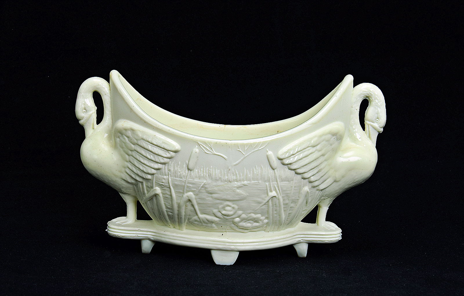 Sowerby Ivory Queensware, double ended swan trough with lilies and bullrushes